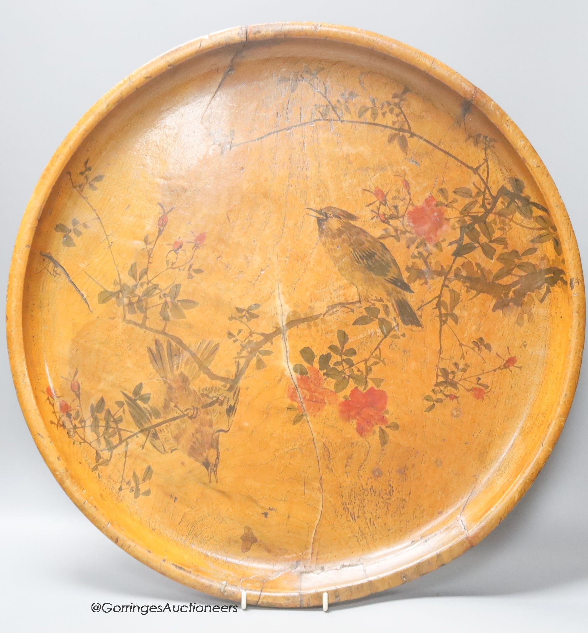 A large Japanese elm charger, painted with songbirds and flowers in the Japanese taste, diameter 51cm